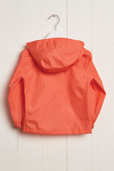 Coral Rain Cheater waterproof jacket by British brand Grass & Air - modern, stylish rainwear for kids