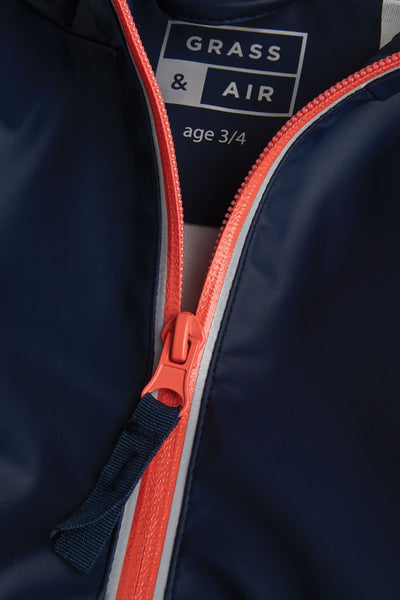 Girls Navy Rainster waterproof jacket by British brand Grass & Air - modern, stylish rainwear for kids