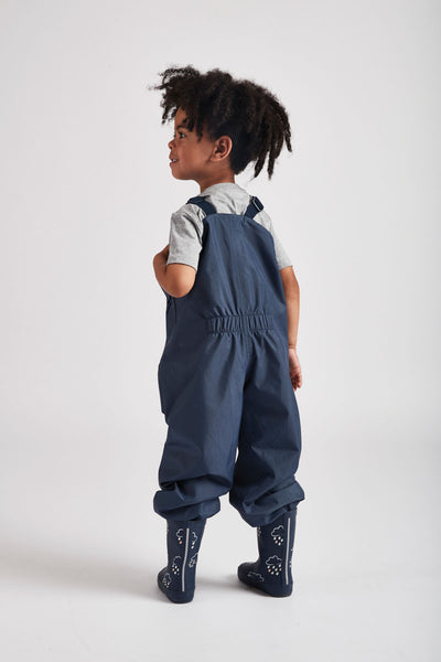Navy Stomper Slacks waterproof wader trousers by British brand Grass & Air - modern, stylish rainwear for kids