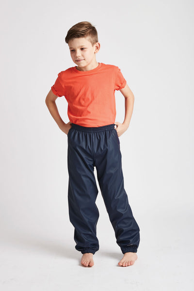 Unisex Navy Rain Runners waterproof trousers by British brand Grass & Air - modern, stylish rainwear for kids
