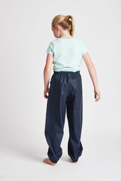 Unisex Navy Rain Runners waterproof trousers by British brand Grass & Air - modern, stylish rainwear for kids